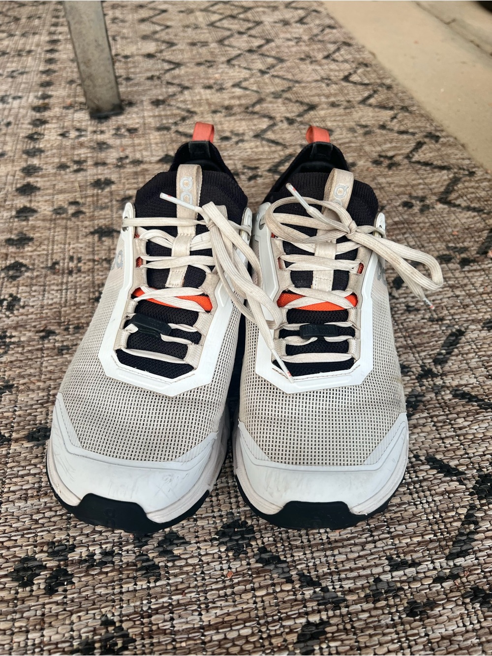 On Cloud trail running sneakers with Black & Orange Accents